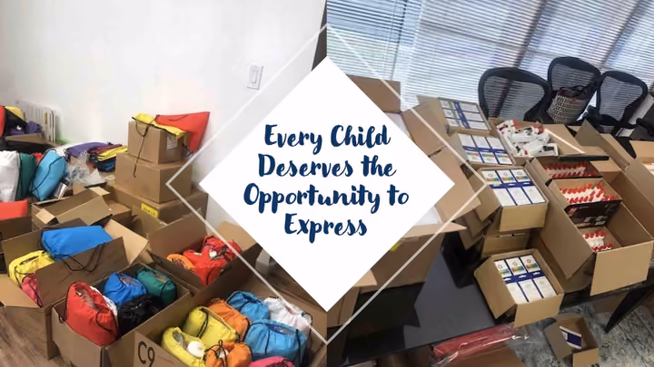 Boxes of art and school supplies sorted across a floor, captioned Every Child Deserves the Opportunity to Express